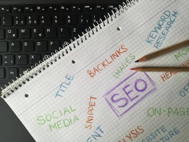 Journal with words relevant to SEO written down